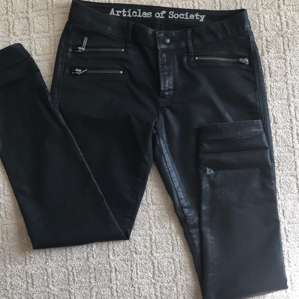 Black wax coated jeans.